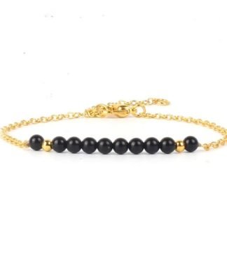 Bracelet dore pierre noir