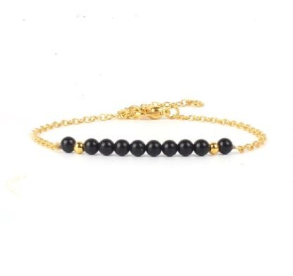 Bracelet dore pierre noir